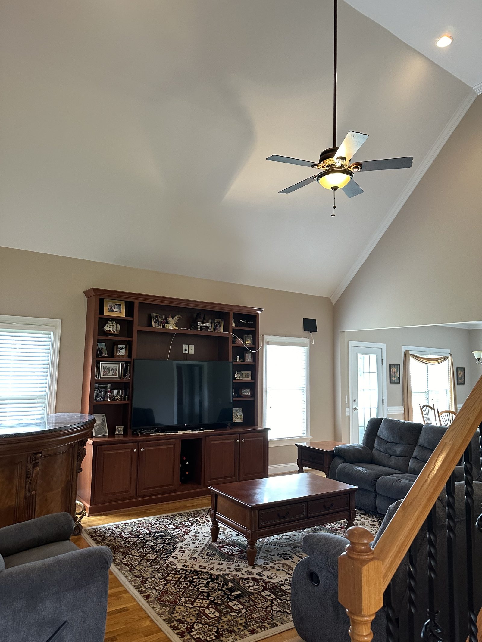 Vaulted living room with freshly painted walls and ceiling — interior painting by Roca’s Painters of Mebane, NC