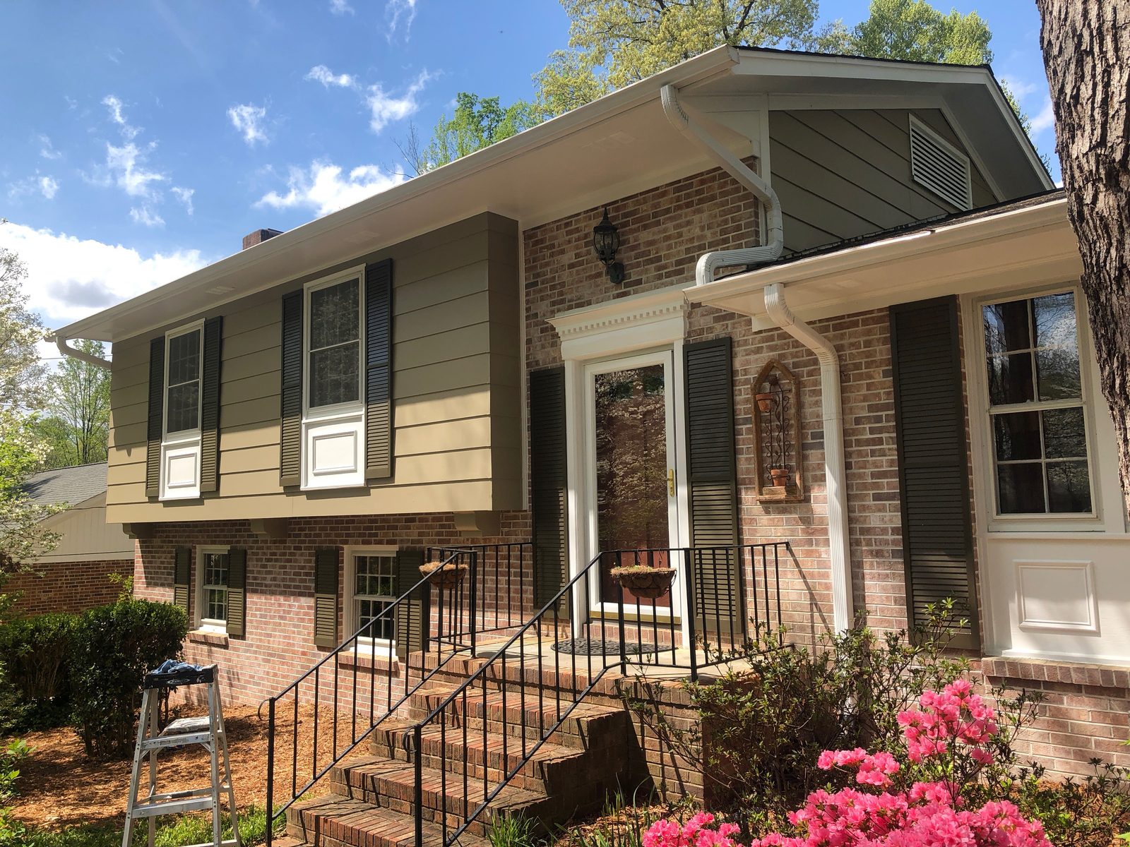 Exterior painting project on a home in Greensboro, NC — exterior painting by Roca’s Painters of Mebane, NC